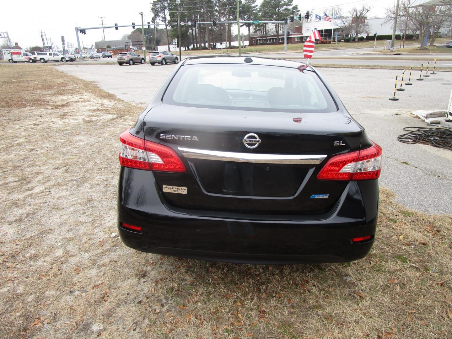 2014 Black Nissan Sentra S 6MT (3N1AB7AP6EY) with an 1.8L L4 SFI DOHC 16V engine, 6-Speed Automatic transmission, located at 2553 Airline Blvd, Portsmouth, VA, 23701, (757) 488-8331, 36.813889, -76.357597 - Photo#6